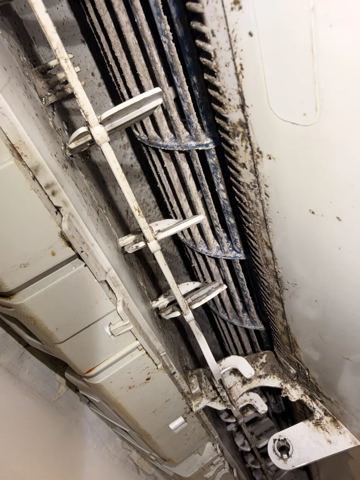 Accumulated dirt on the indoor air outlet and blower