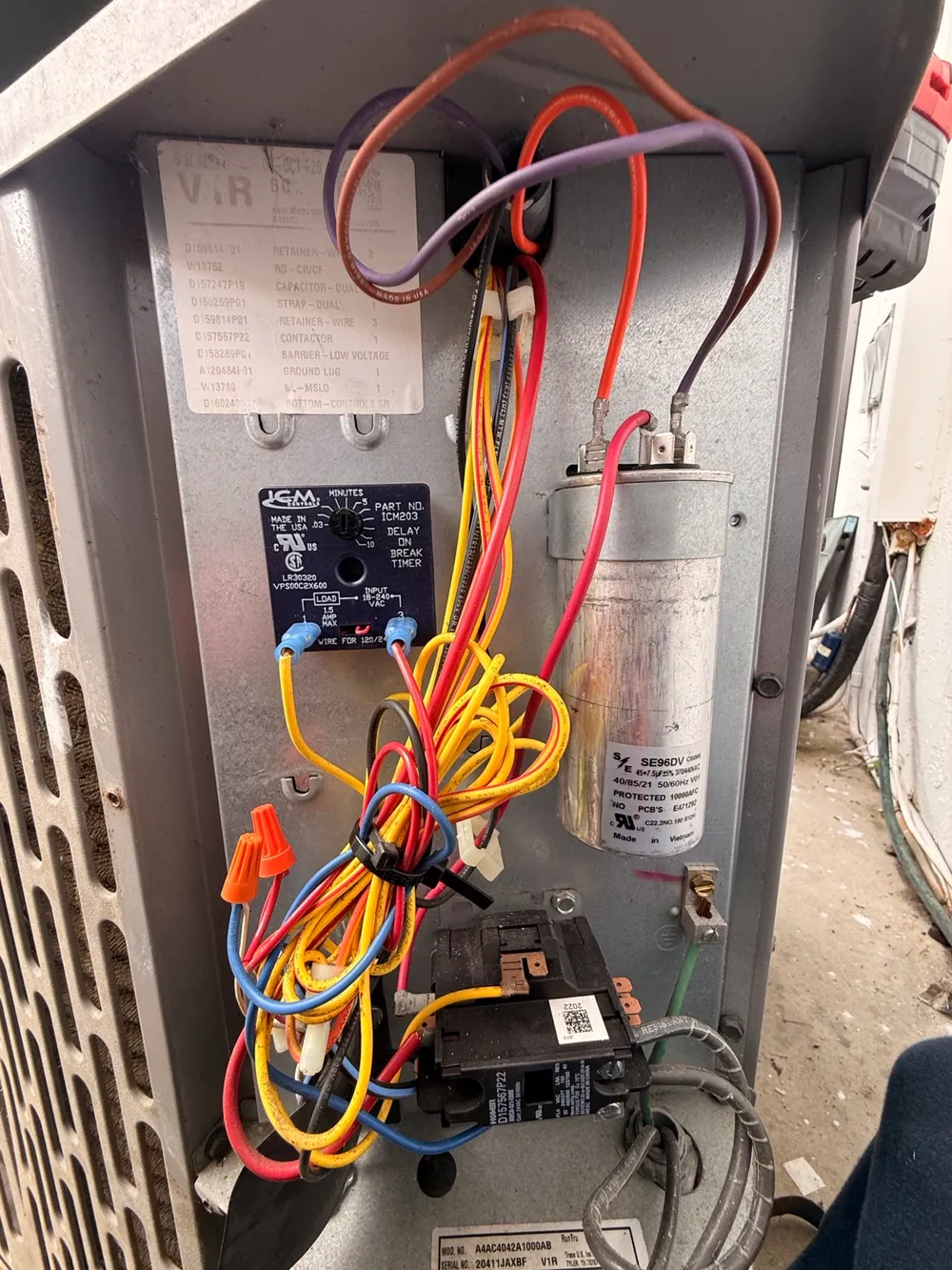 Restart delay timer, capacitor and contactor in an outdoor AC unit